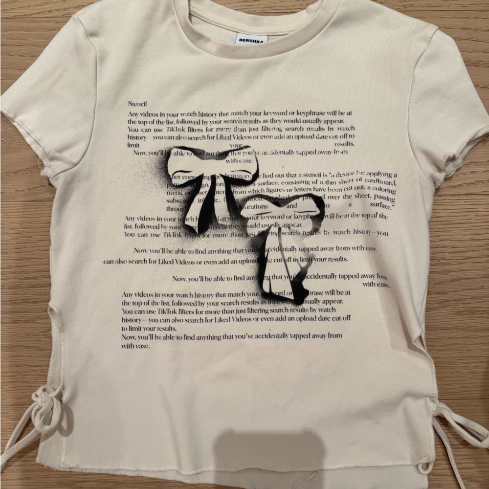 Bershka Cream Tee with Black Bow Accents